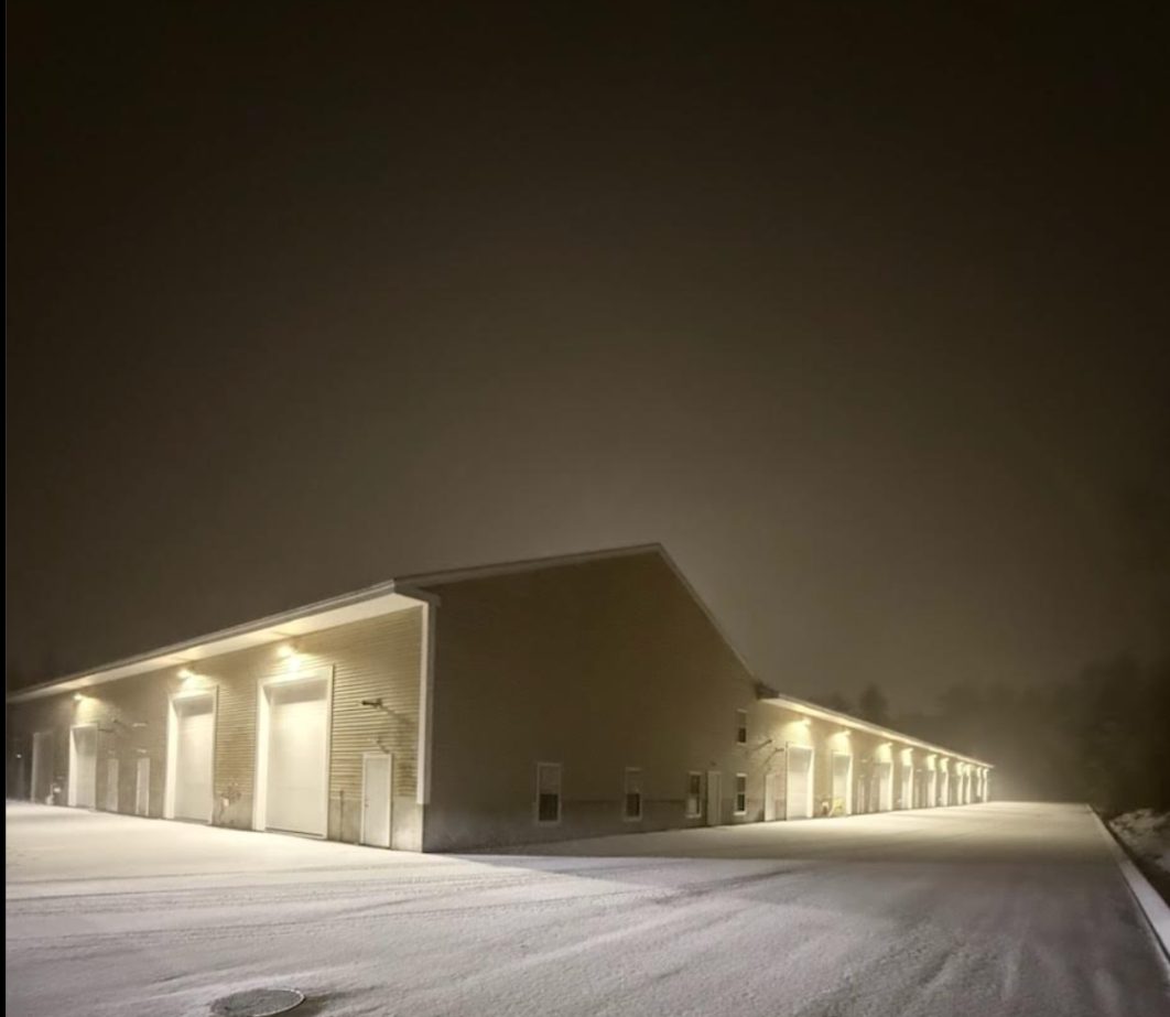 85 Ledge Road, Seabrook, New Hampshire flex building lit at night