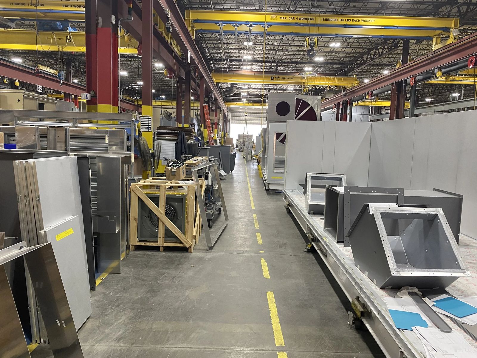 Main manufacturing floor at 79 Monroe Street with overhead cranes